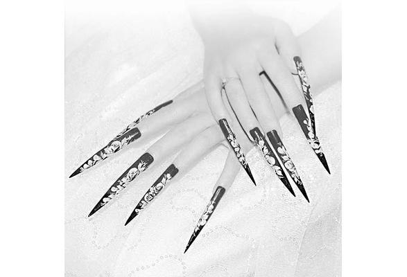 Why do people get super long fake nails? image 4