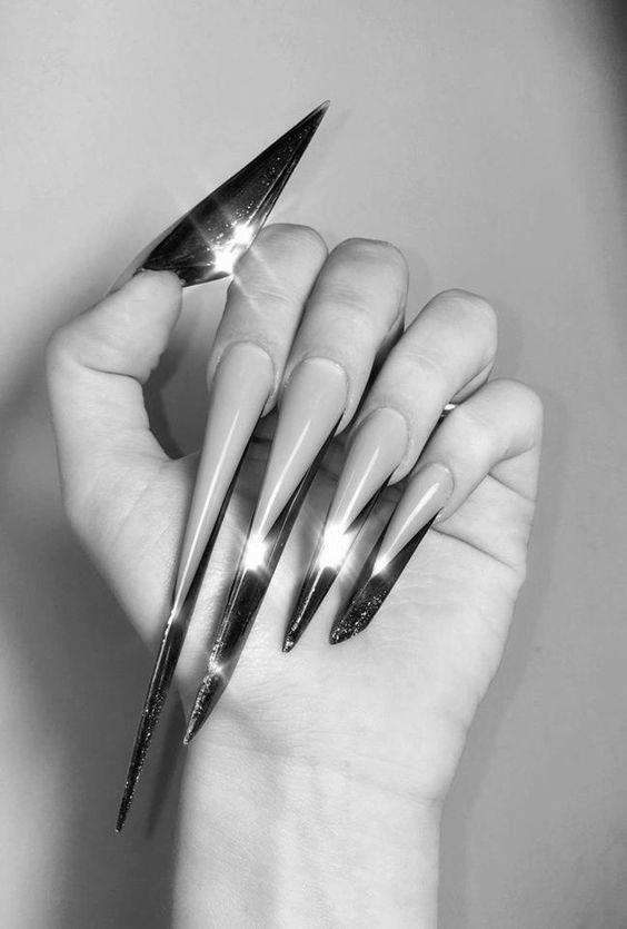 Why do people get super long fake nails? image 7