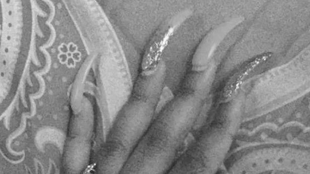 Why do people get super long fake nails? image 9