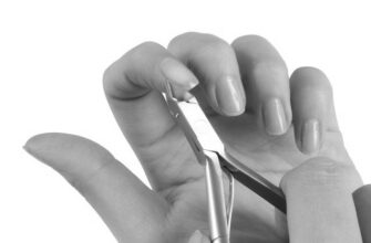 When having a manicure, why is the cuticle cut off? image 0