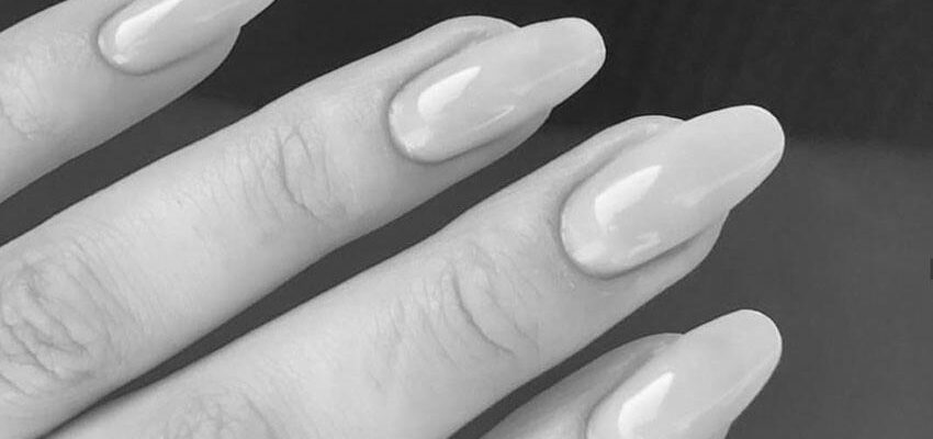 How do acrylic nails harm natural nails? image 0
